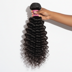 Hand holding Deep Curly Virgin Brazilian 