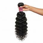 Hand holding Deep Wavy Virgin Brazilian Hair Bundle with Prime Edge Branding
