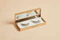 Natural wispy 5D strip lashes in gold case by Prime Edge Hair Co.